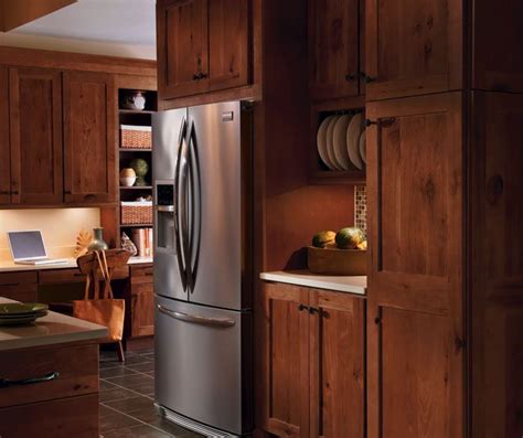 Any preference between kraftmaid and homecrest kitchen cabinets? Rustic Hickory kitchen cabinets by Homecrest Cabinetry ...