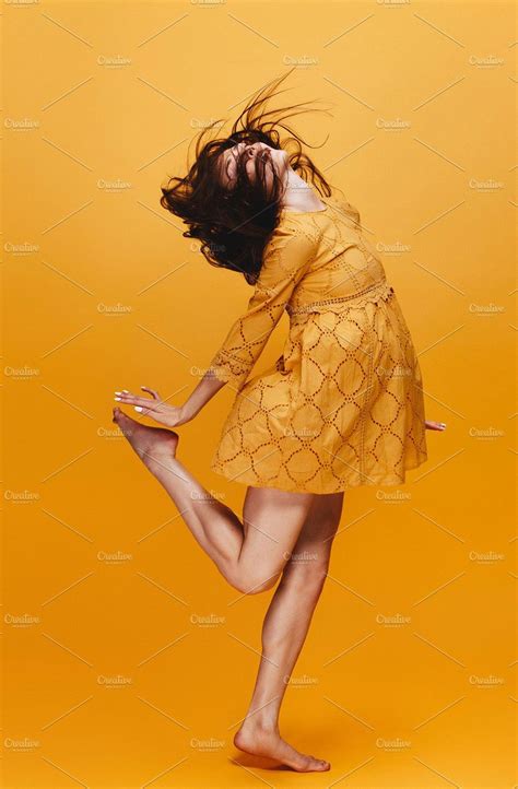 Woman Dancing In Orange Dress Female Portrait Poses Best Fashion