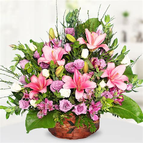 Send Flowers Turkey Lilies And Lisianthus In Basket From 81usd