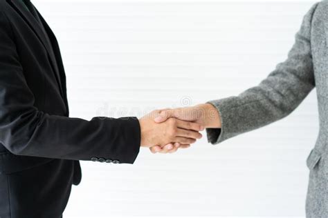 Young Businessman Shakes Hands And Agrees To Cooperate In Business