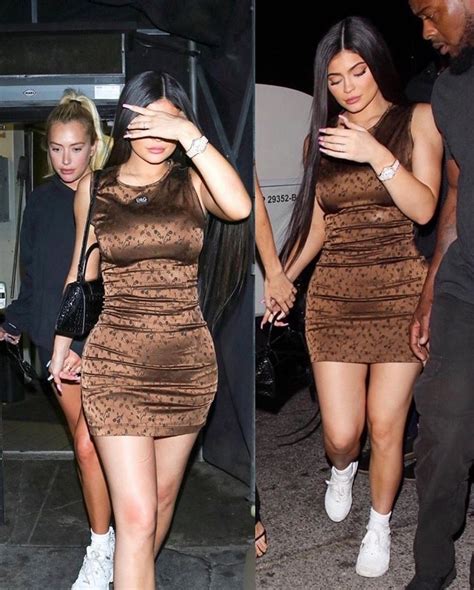Kylie Jenner Flaunts Her Famous Curves In A Figure Hugging Brown Dress Artofit