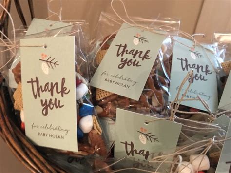 Do you have baby shower messages to write on card? Trail mix favors with thank you tags for baby boy woodland ...