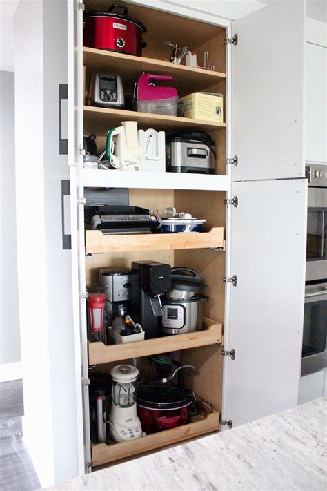 Add An Appliance Pantry To Your Kitchen With Pull Out Shelves To