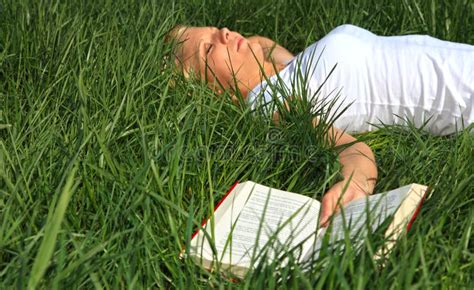 Young Woman Taking A Nap Outside Stock Image Image Of Field Sleeping