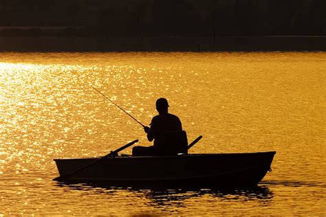 Fishing Silhouette Pictures Images And Stock Photos Istock
