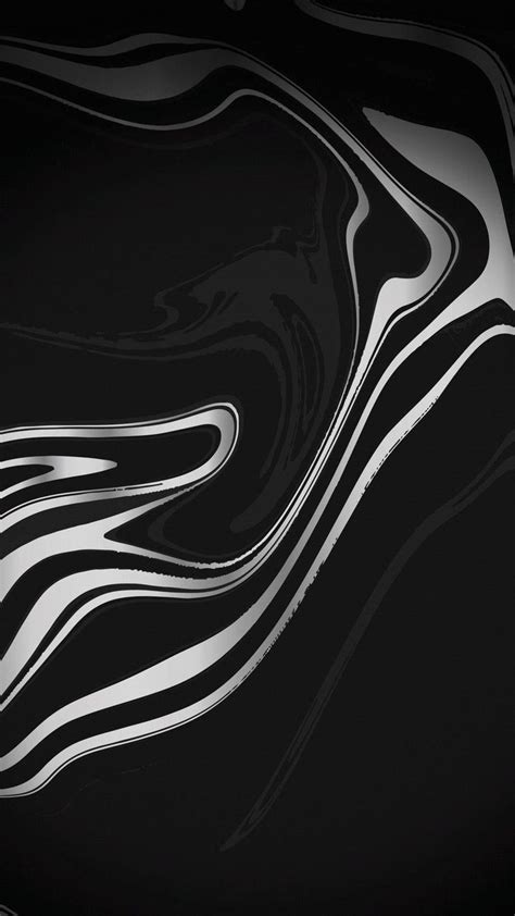 An Abstract Black And White Background With Wavy Lines