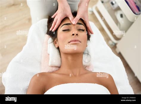 Arab Woman Receiving Head Massage In Spa Wellness Center Beauty And