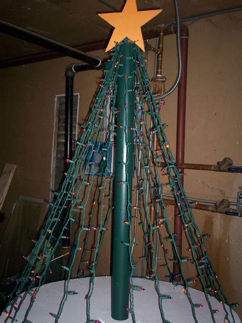 Christmas Tree Made Out Of Plywoodlightspvc Pipe Outdoor Christmas