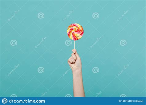 Close Up Female Holding In Hand Colorful Round Lollipop Isolated On ...