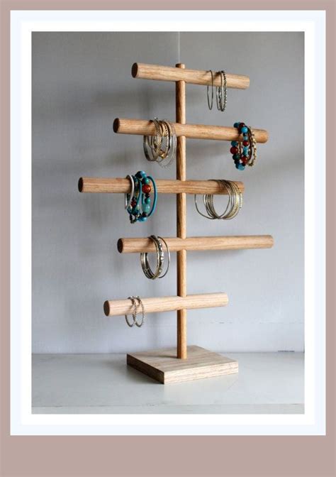 I use simple picture stands to show the jewelry on a unique customized display board. Five Tier Bracelet Holder- Cascading Organizer Jewelry ...