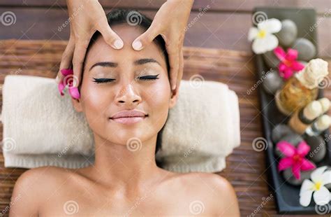 Young Woman Receiving Facial Massage Stock Photo Image Of Lying