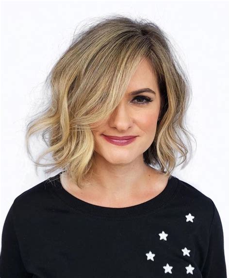 If your hair is too voluminous and too straight, you can adopt a layered asymmetrical short hairstyle. Asymmetrical Bronde Messy Bob | Wavy bob hairstyles, Bob ...