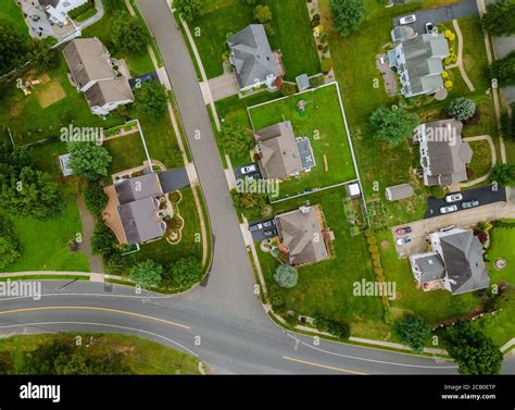 Landscape Scenic Aerial View Of A Suburban Settlement In Usa With