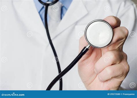 Doctor Holding Stethoscope Stock Photo Image 29573580