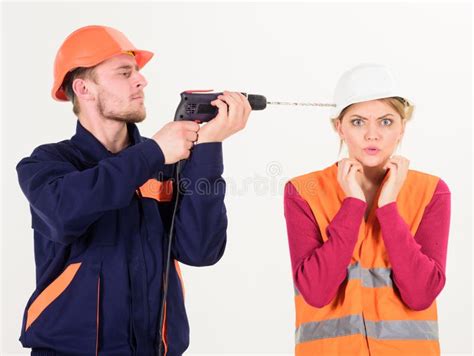 Man With Drill Tool Drills Head Of Woman White Background Stock Photo Image Of Colleague