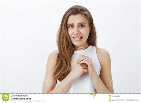 Oops Very Awkward Situation Portrait Of Emberrassed Good Looking European Woman Rubbing Hands