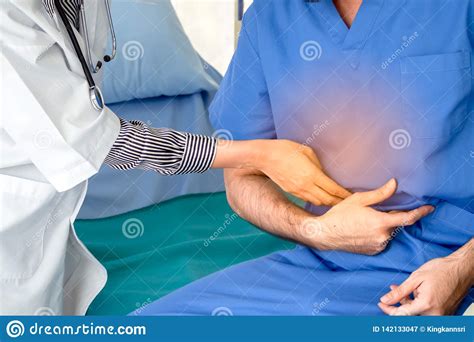 Doctor Examining Patient Stomach In Hospital Stock Image Image Of