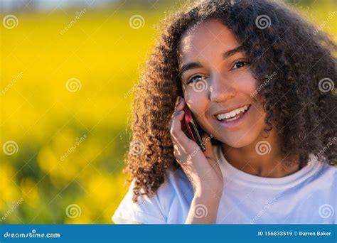 Mixed Race African American Girl Teenager On Cell Phone Stock Image