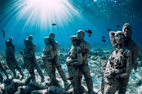 Underwater Statues In Blue Ocean With Fish Underwater Tourism In Ocean
