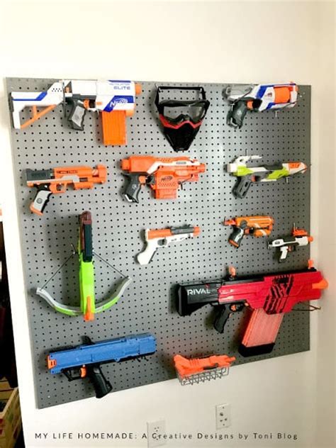 Simple spray paint camo job with easy installation of an. Diy Nerf Gun Storage - Pin On My Style : If you've ever owned a nerf dart gun, you're aware that ...