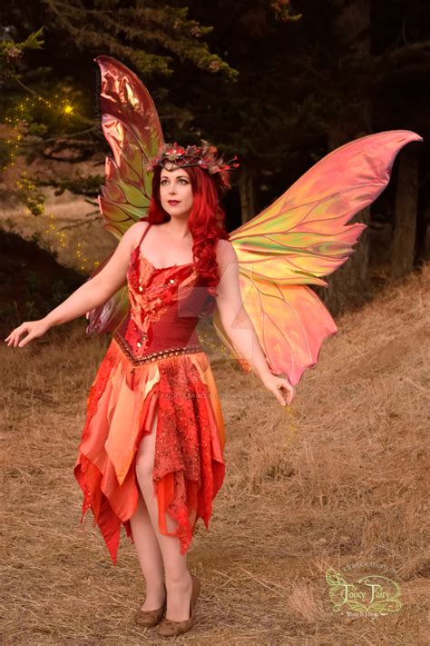 Fire Fairy With Giant Clarion Wings Leaning Back By Faeryazarelle On