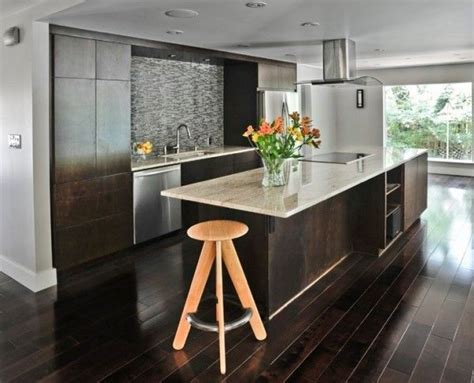 Selecting kitchen flooring with rebecca robeson. Dark kitchen cabinets with dark hardwood floors | Kitchen ...