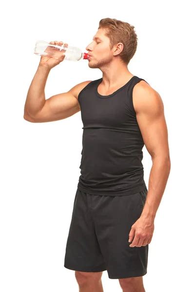 Young Athletic Sport Man Thirsty Drinking Water Holding Bottle Pouring