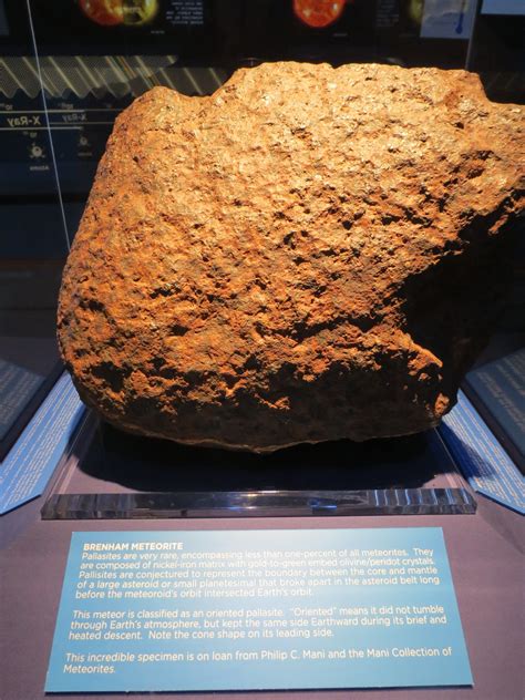 A Beautifully Displayed 400 Pound Rare Pallasite Meteorite From The