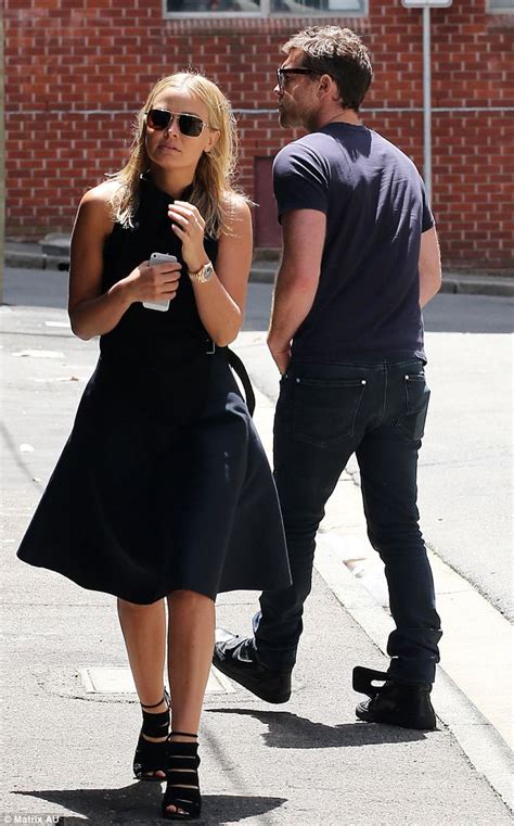 Newly Wed Lara Bingle Works Chic Asymmetric Outfit As She Takes A Stroll With Beau Sam