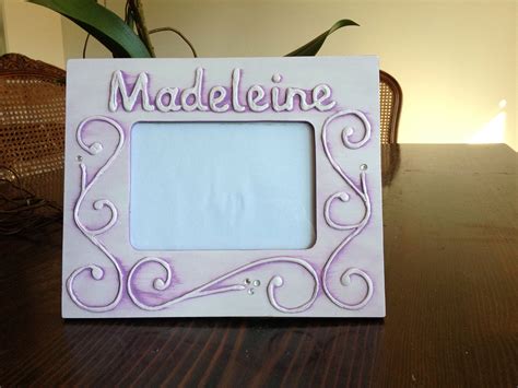 A Beautiful Lilac Coloured Personalized Picture Frame For A Baby Girl