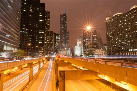 Chicago Multi Level Road System Leads Into City At Night Stock Photo