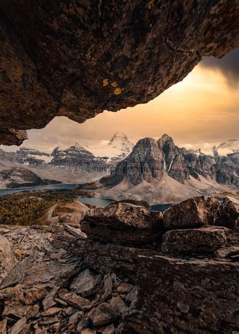 Mount Assiniboine And Stone Cave On Nublet Peak At The Sunset Stock