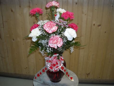 One Dozen Carnations In A Vase