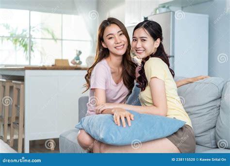 portrait of asian beautiful lesbian woman couple smile look at camera attractive two female