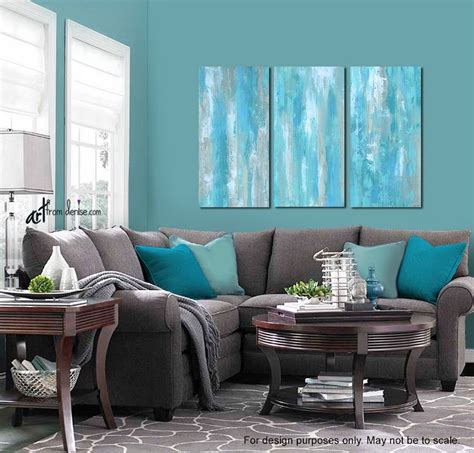 Surprising pops of color like hot pink, gold and bright teal add excitement and character to this otherwise neutral space. Large aqua blue abstract triptych, Teal gray tan white ...