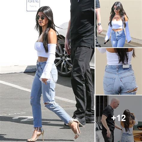 Kourtney Kardashian Shows A Glimpse Of Her Pert Derriere With A Rip Beneath Her Bottom In Jeans