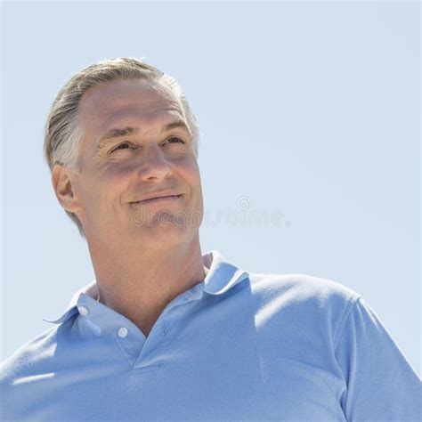 Happy Man Looking Away Against Clear Sky Stock Photo Image Of Smiling