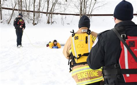 Fort Drum Firefighters Train On Remington Pond For Cold Weather Rescues