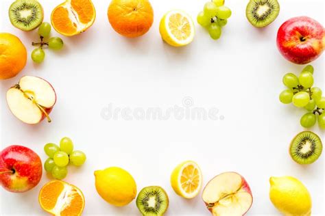 Oranges Lemon Apple Kiwi And Grape Healthy Food Concept With