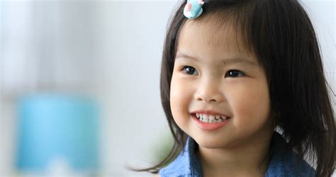 Close Up Portrait Of Beautiful Young Asian Girl Smile Talking And Thinking With Smile Face