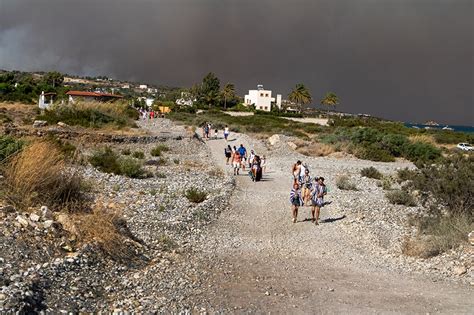 rhodes wildfires prompt biggest ever greek fire evacuation abs cbn news
