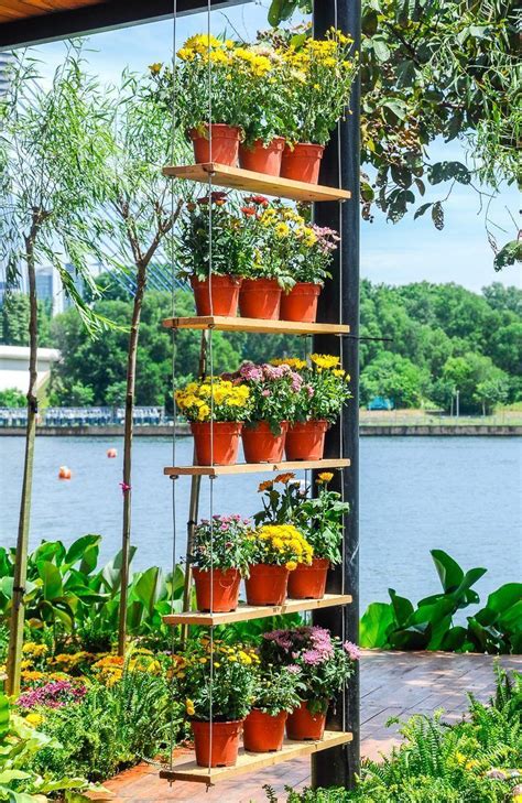 When you're short on flowerbeds and veggie patches our tip is to get clever with the room dividers are a great way to make a vertical garden that not only doesn't take up much room but also makes a fresh way to separate your homes. I love these creative DIY vertical garden ideas. Whether ...