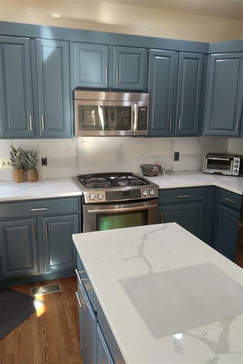 Waterloo Blue A Sherwin Williams Color Updated An Orangy Oak Kitchen