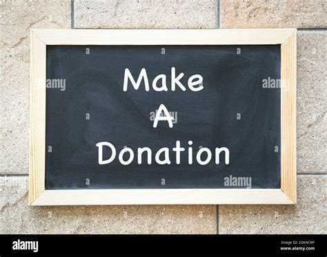 Blackboard With Message Make A Donation Charity Concept Stock Photo
