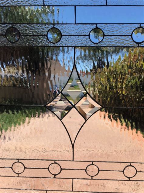 The Poway Beveled And Stained Glass Window Insulated In Tempered Glass And Vinyl Framed