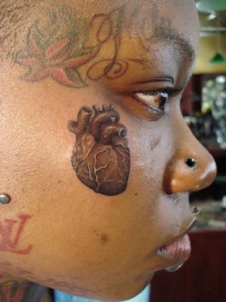 39 Face Heart Tattoo Ideas Heart Tattoo Tattoos Face Tattoo
