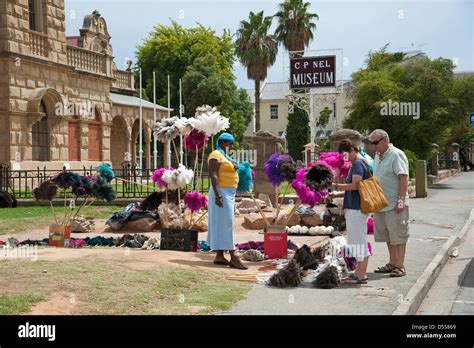 Ostrich Feather Seller Outside The C P Nel Museum In Oudtshoorn South