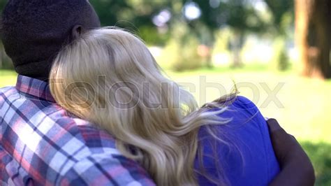 Interracial Couple Embracing Romantic Stock Image Colourbox