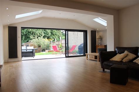Vaulted ceilings are a desirable architectural feature and can allow for some interesting lighting choices in your home. A rear extension was built on this semi-detached home to ...