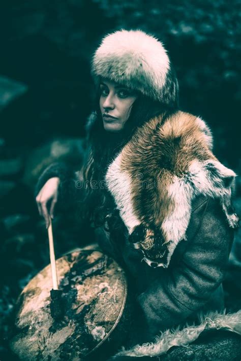Portrait Of A Woman Wearing Fur Hat And Fox Fur Pelt On Her Shoulders